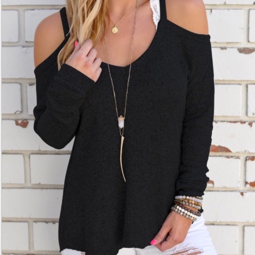 NWOT. Cold shoulder black top.